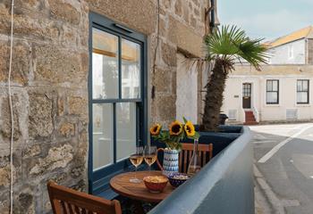Soak up the sun with a cold glass of wine.