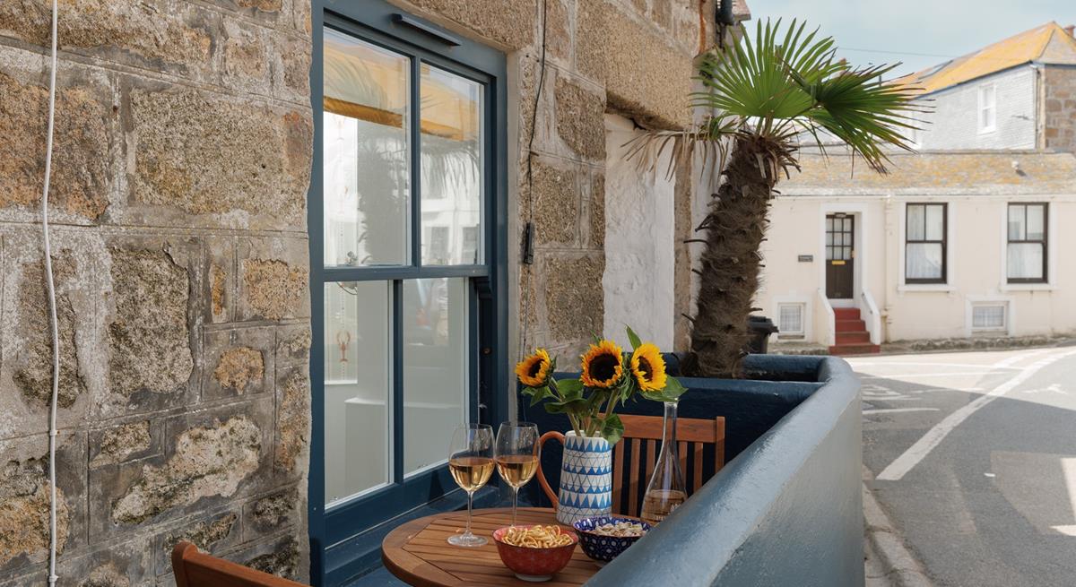 Soak up the sun with a cold glass of wine.