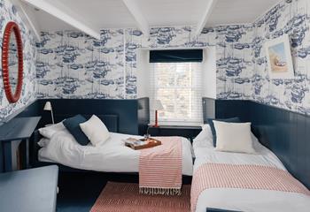 Bedroom 2 boasts stunning nautical themed decor and is perfect for children and adults.