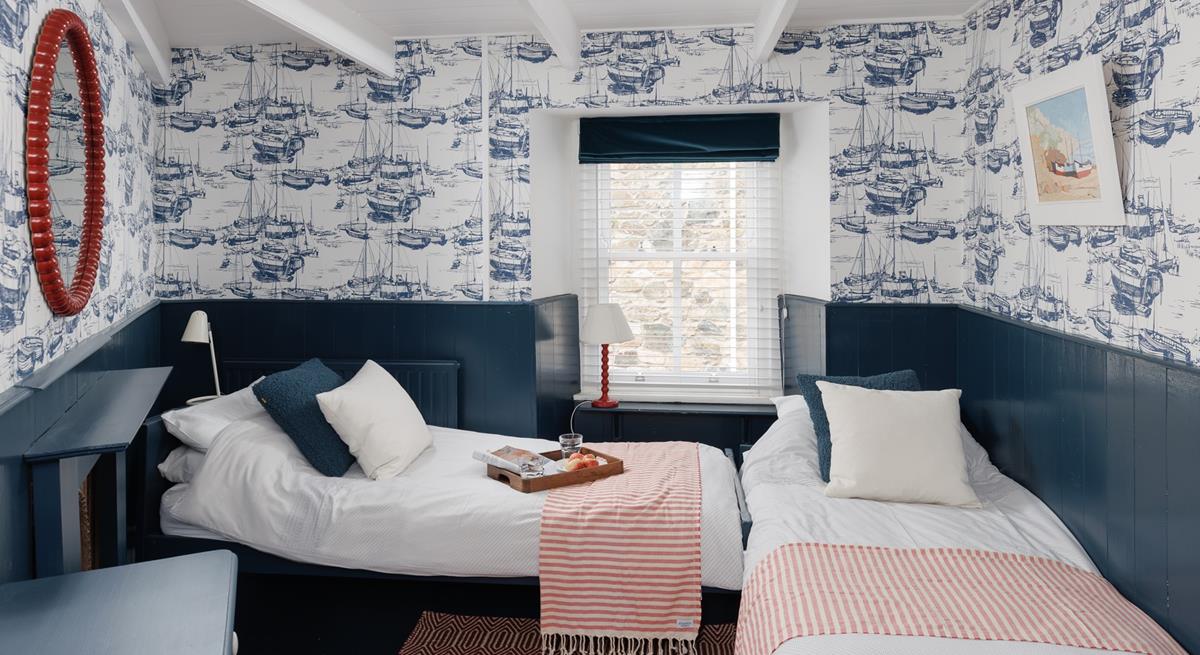 Bedroom 2 boasts stunning nautical themed decor and is perfect for children and adults.