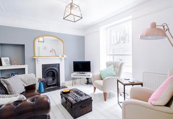 The beautiful sitting room is a cosy base for the whole family to spend evenings together.