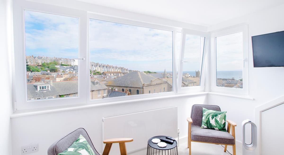 Bedroom 3 has a large dormer window with stunning harbour views. 