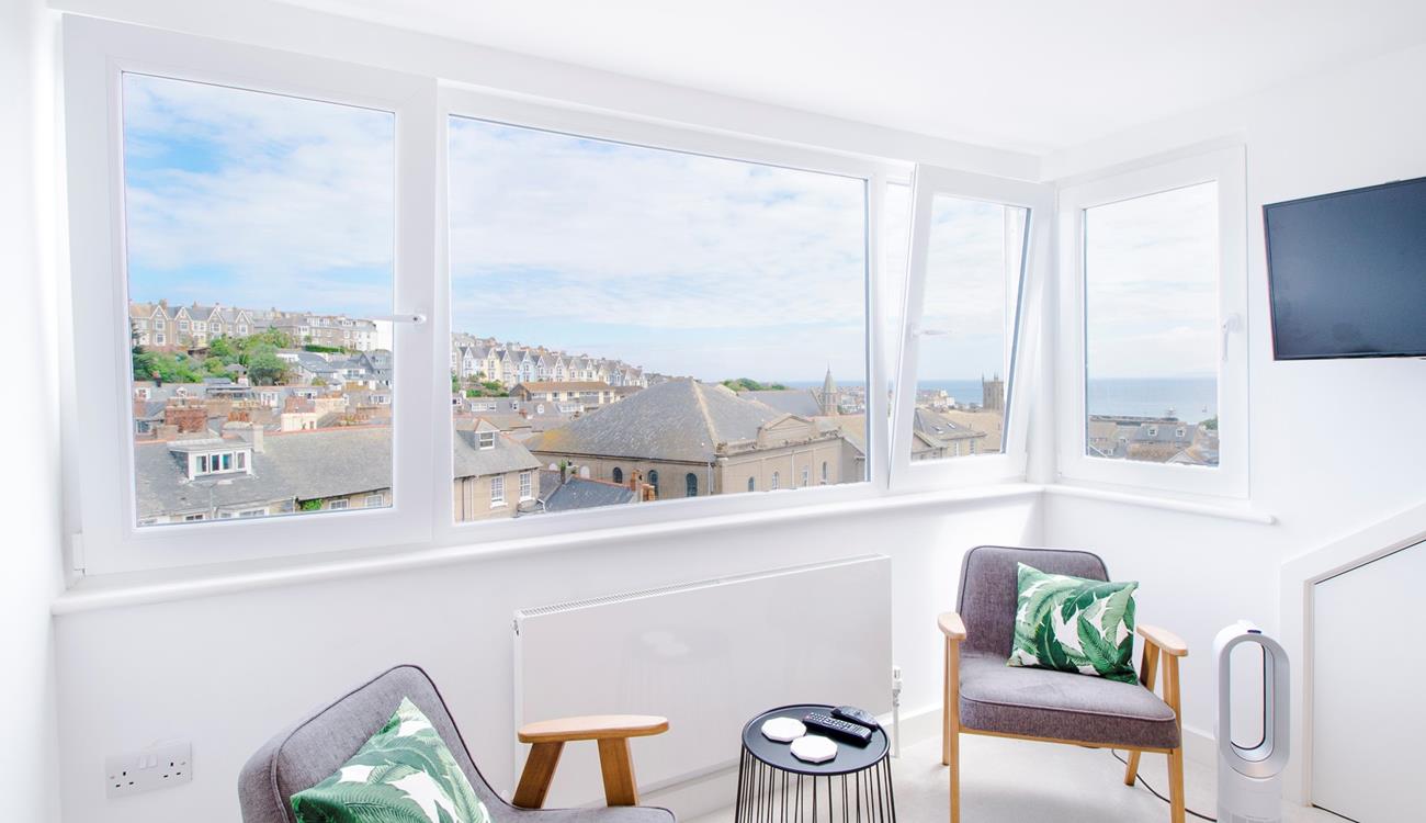 Bedroom 3 has a large dormer window with stunning harbour views. 