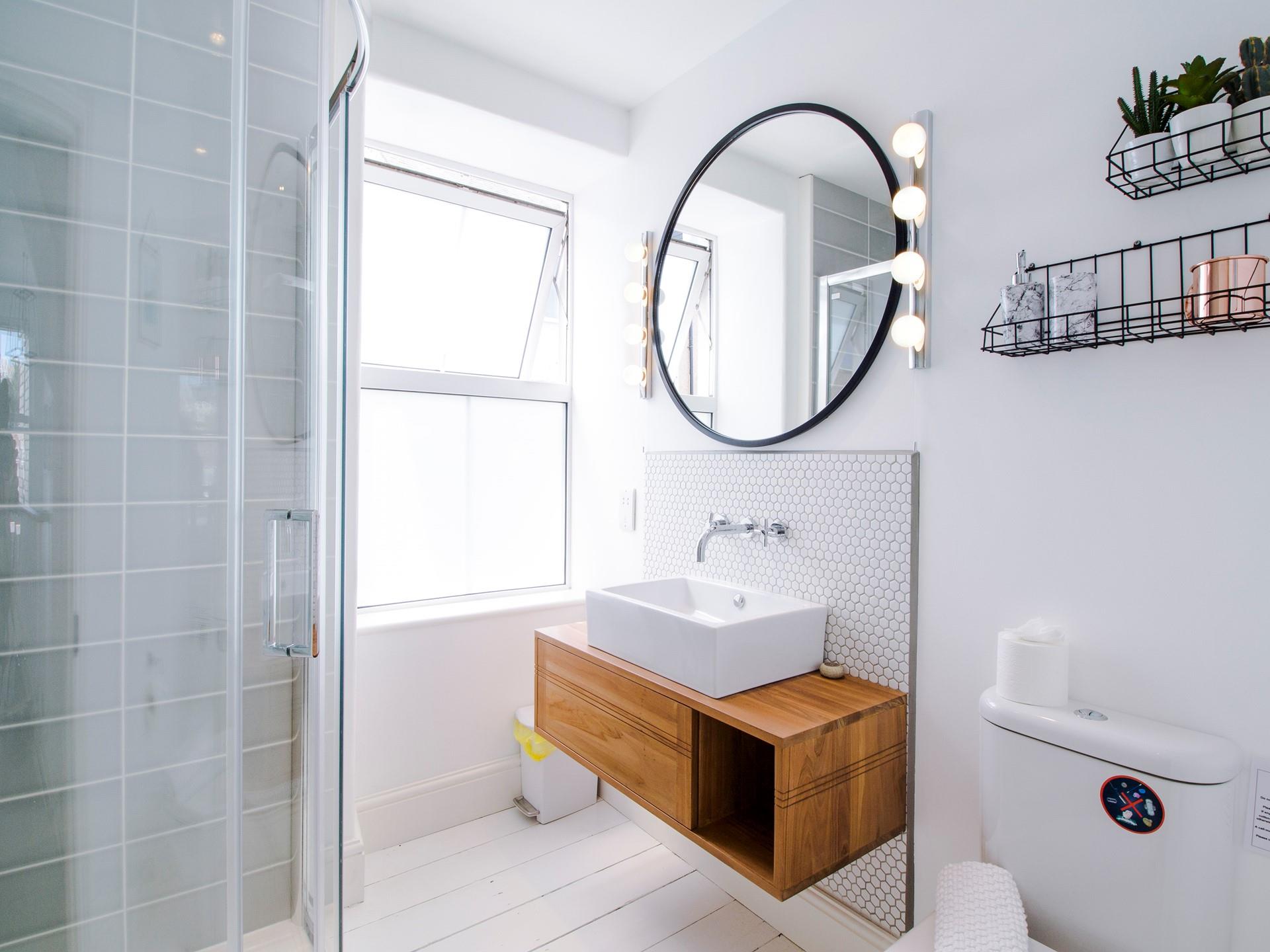 The sleek modern shower room is a stylish space to get ready.