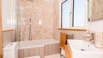Relax and unwind with a soak in the tub.