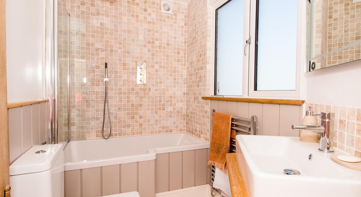 Relax and unwind with a soak in the tub.