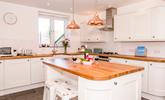 Beautifully appointed kitchen with island and seating for 2. - Thumbnail Image