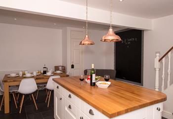 The open plan kitchen/dining area is a great space to entertain whilst dinner is cooking. 