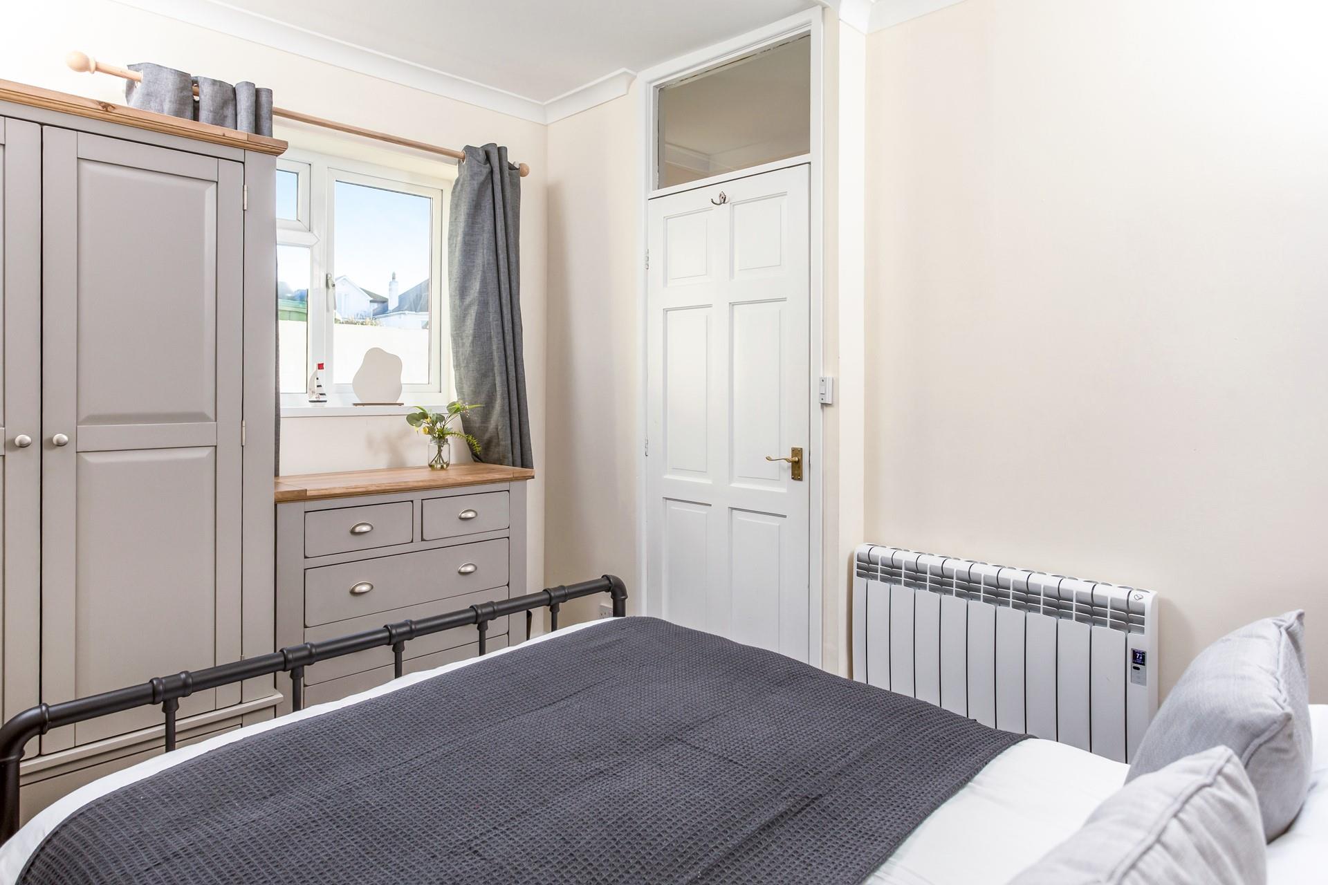 Calming grey interiors ensure a relaxing night's slumber.