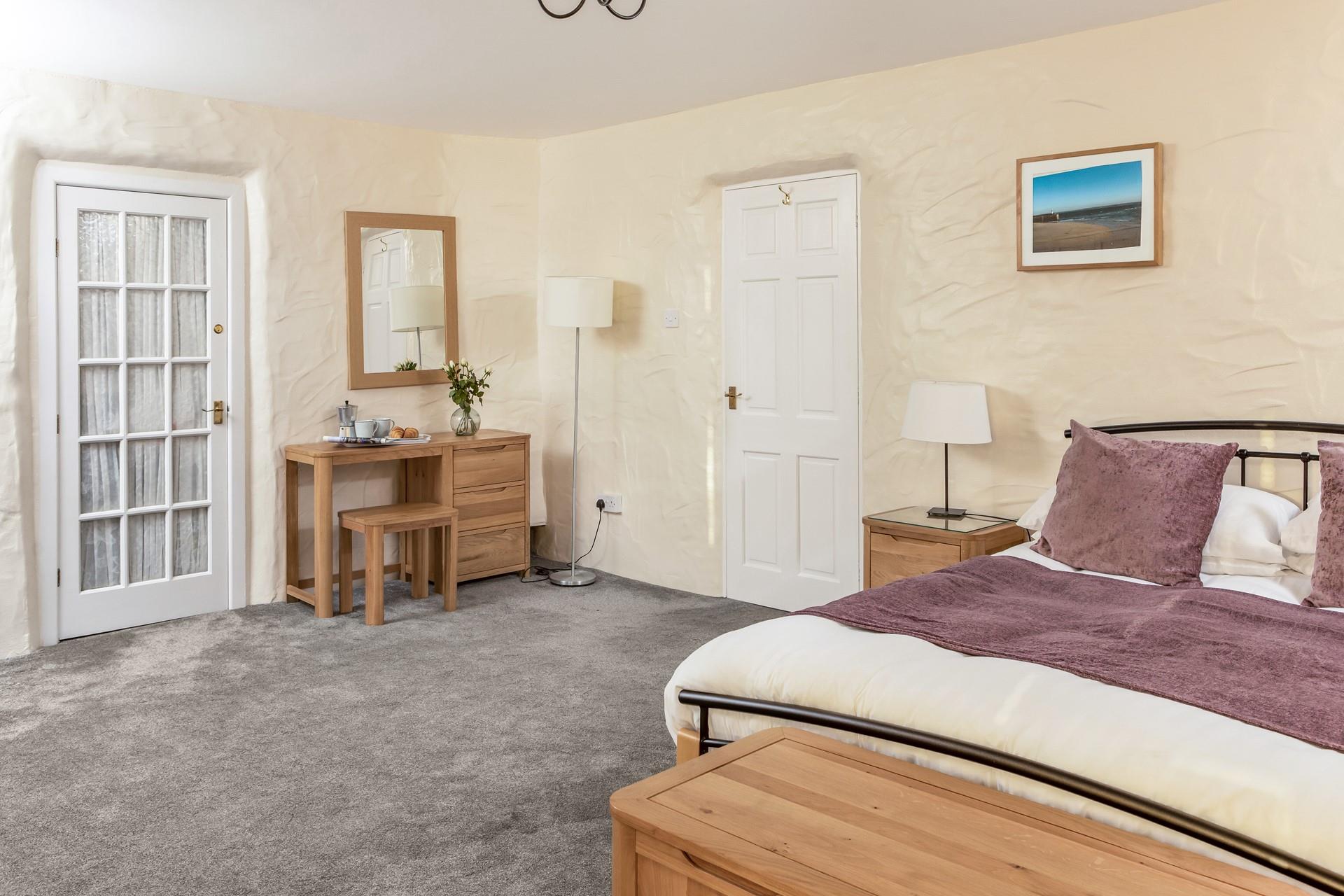 Bedroom 2 is super spacious and light, perfect for rest and rejuvenation.