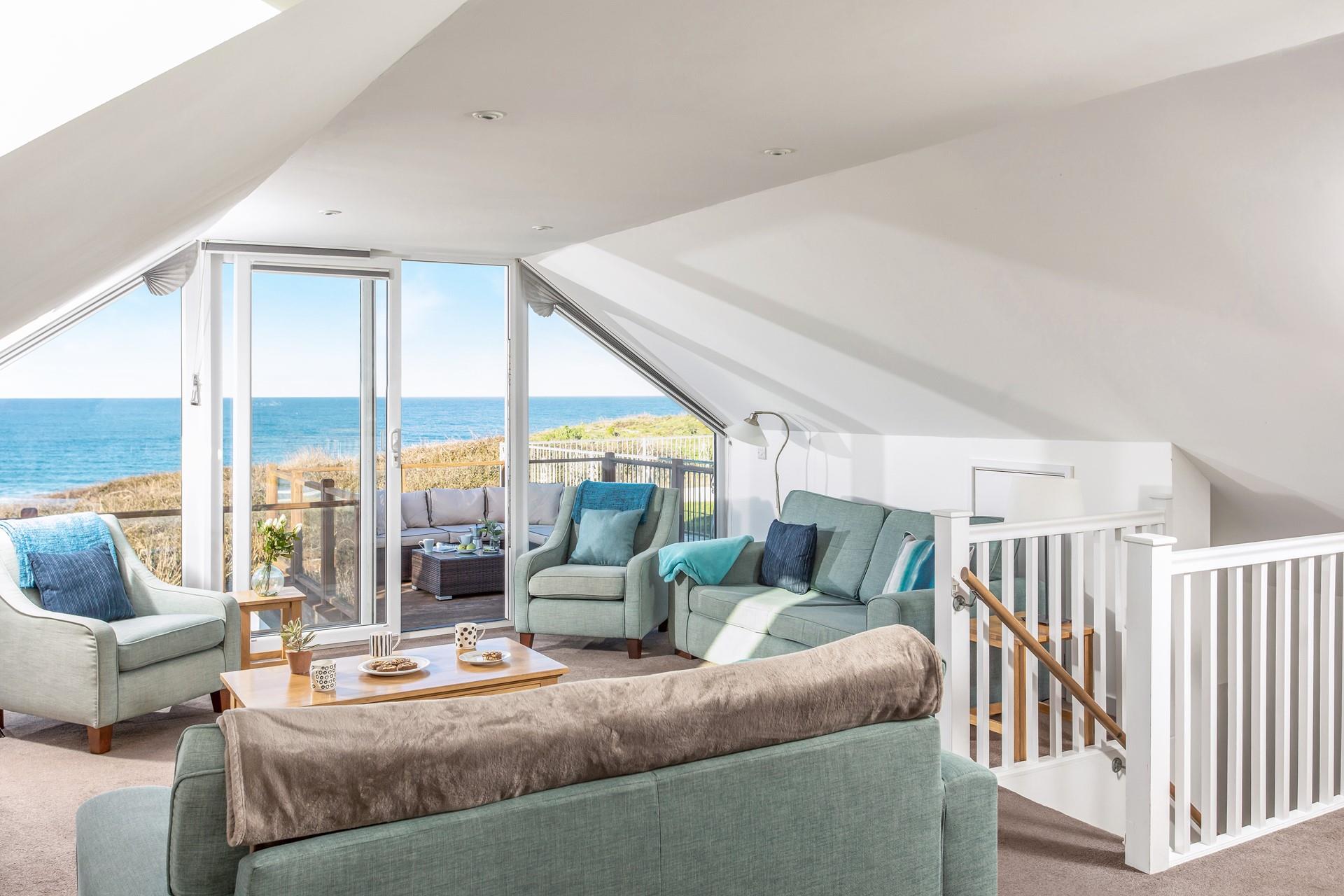 Sip an afternoon cuppa watching the waves roll onto the beach.