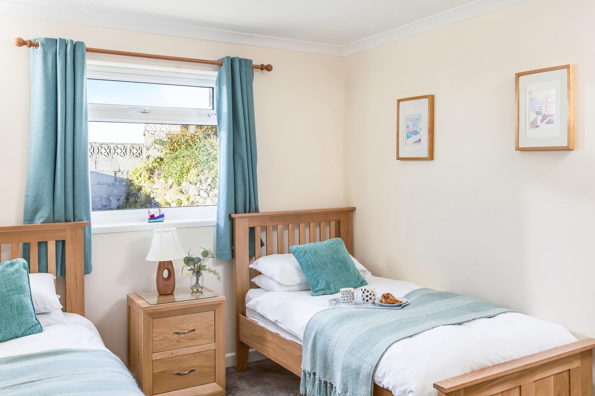 The twin beds are perfect for the kids to tuck into each night.