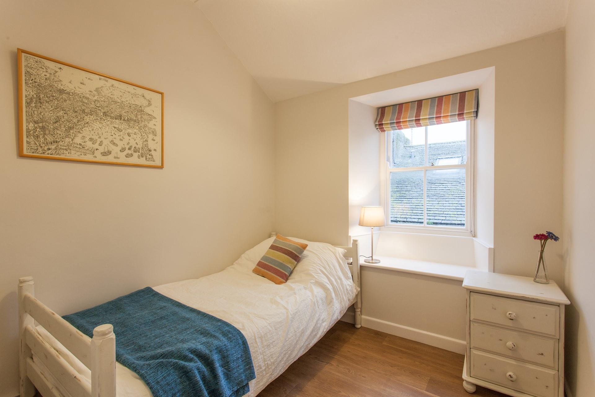 Bedroom 2 has a single bed to snuggle into each night.