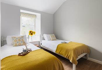 Bedroom 3 has twin beds, perfect for kids or adults to sink off for a restful night's sleep.