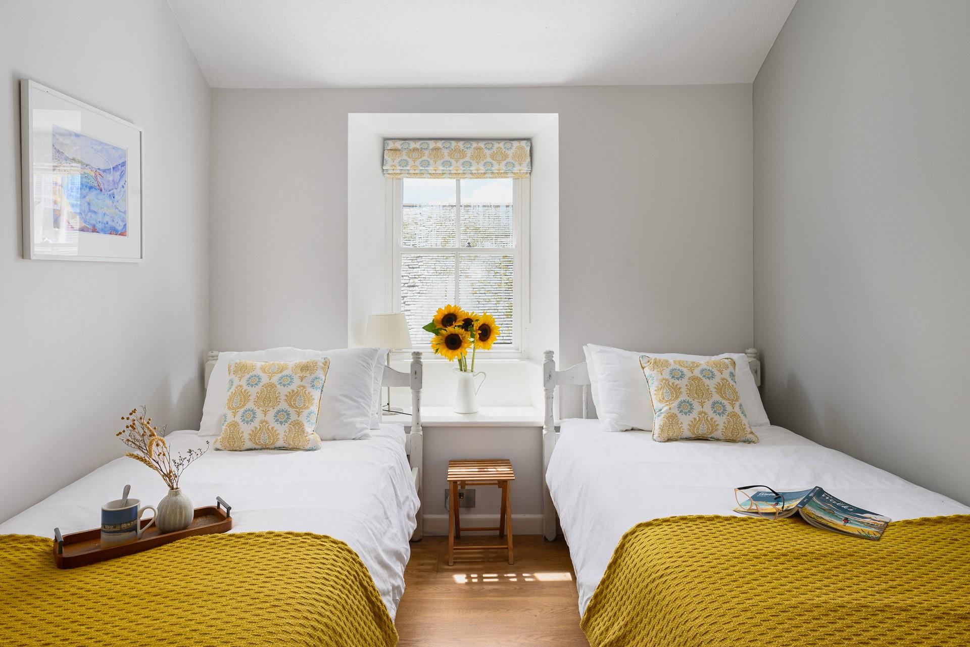 Bedroom 3 is bright and cosy, perfect to rest and rejuvenate after a day of exploring.