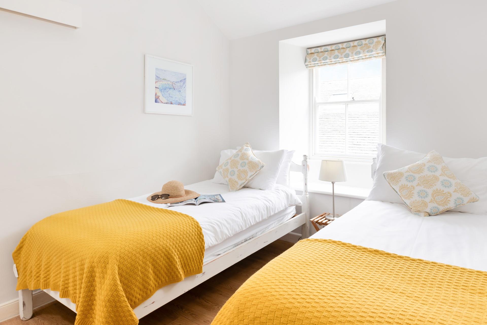 Bedroom 3 is bright and cosy, perfect to rest and rejuvenate after a day of exploring.