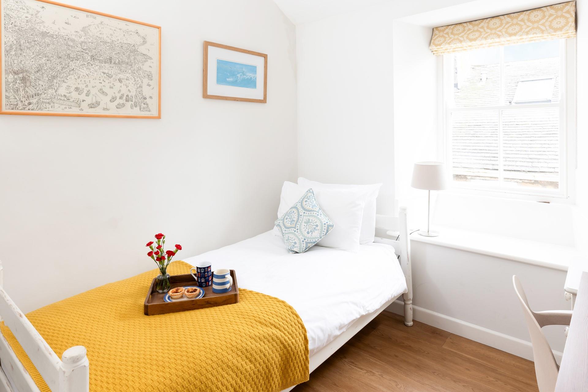 Bedroom 2 has a single bed to snuggle into each night.