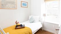 Bedroom 2 has a single bed to snuggle into each night.