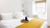The king size bed offers a dreamy night's sleep after a busy day exploring Cornwall.