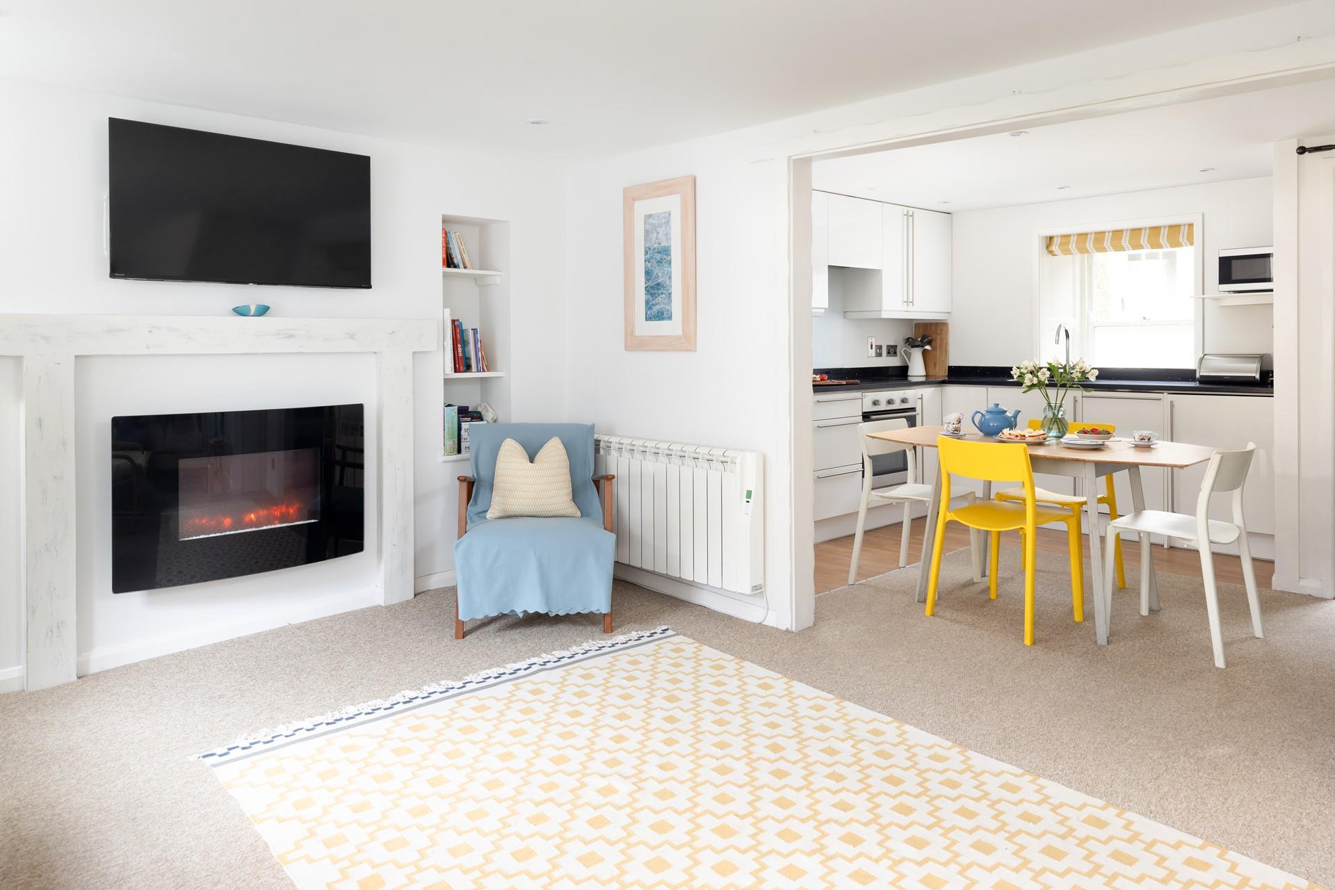 The bright and spacious living area provides a space for you to relax in the evening.