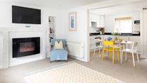 The bright and spacious living area provides a space for you to relax in the evening.