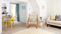 Curl into the chair and relax with a book after a day of beach adventures. 