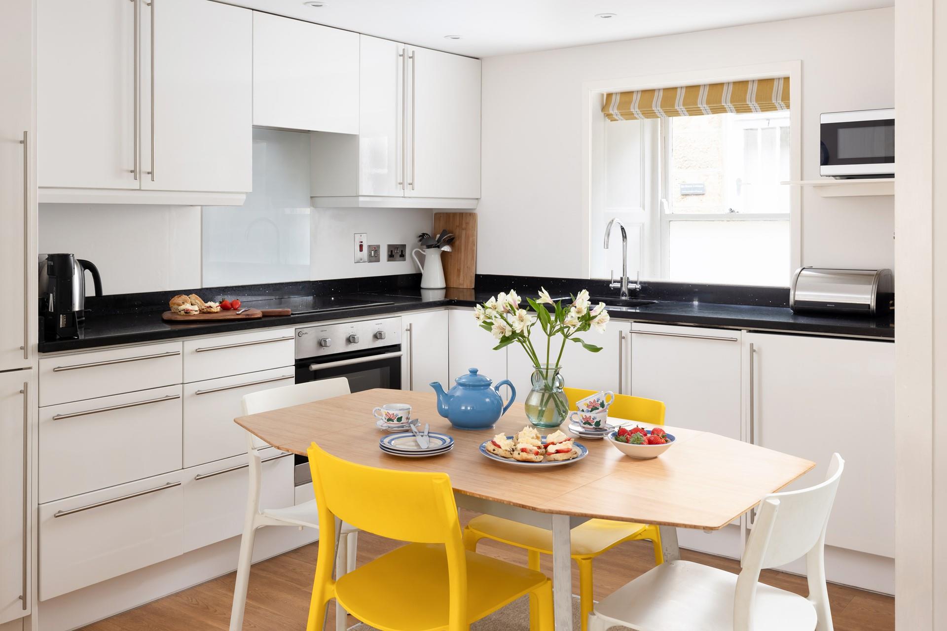 The well-equipped kitchen is perfect for cooking tasty meals.