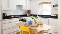 The well-equipped kitchen is perfect for cooking tasty meals.
