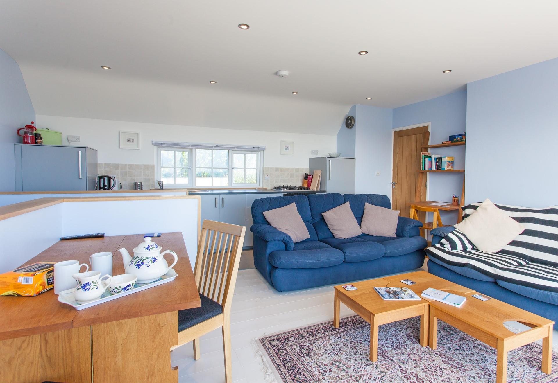 Enjoy a cosy evening together in the open plan living area. 