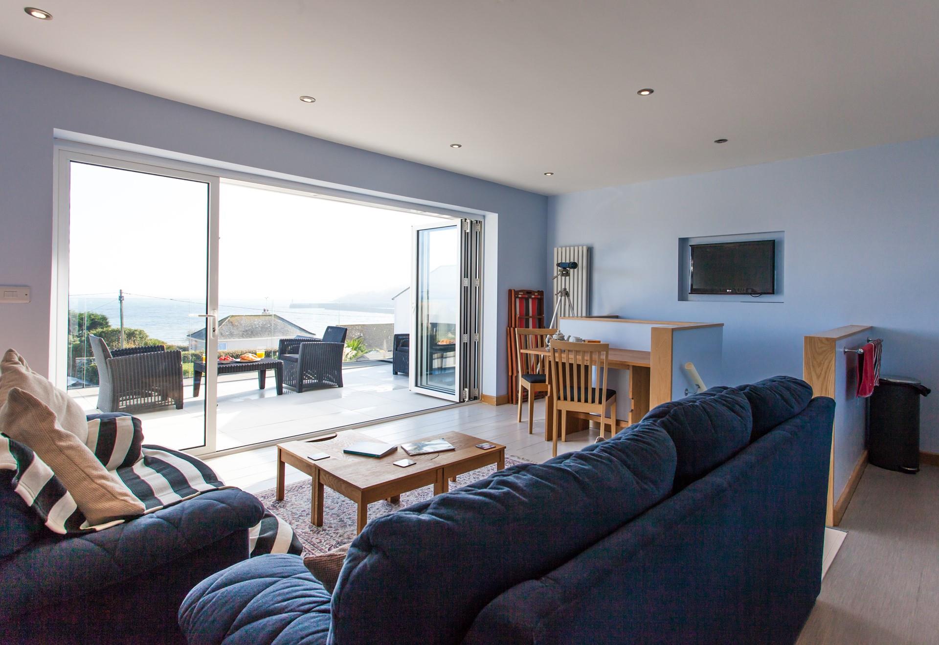 Snuggle up and watch a movie or venture onto the balcony and enjoy the sunset with a drink. 