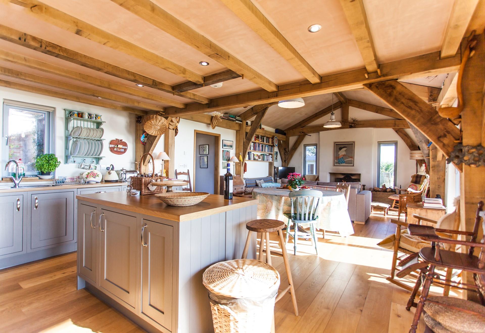 This timber-framed house blends modern living with traditional style features and classic furnishings.