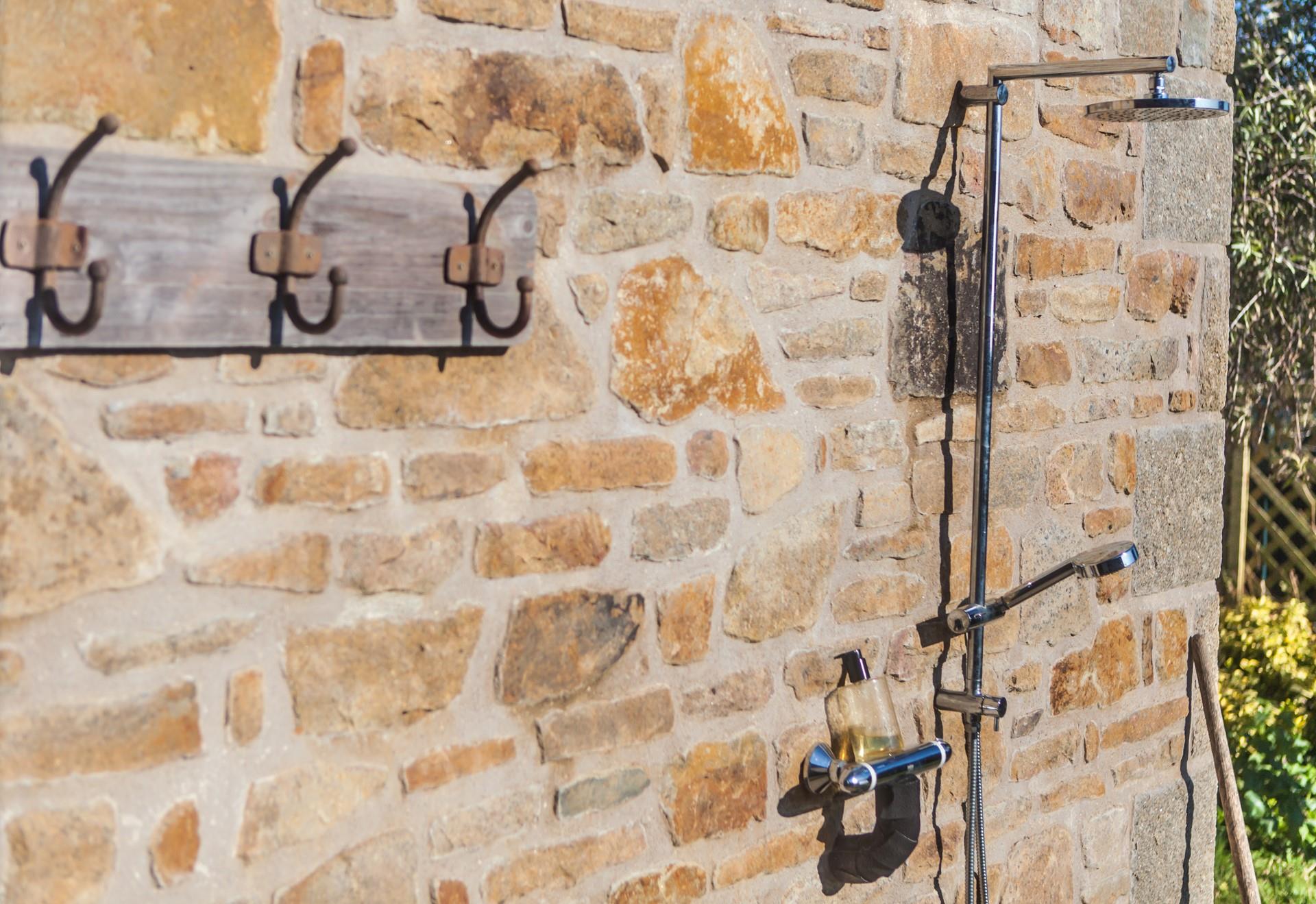 The outside shower is perfect for rinsing off the sand after a day of adventures on the beach!