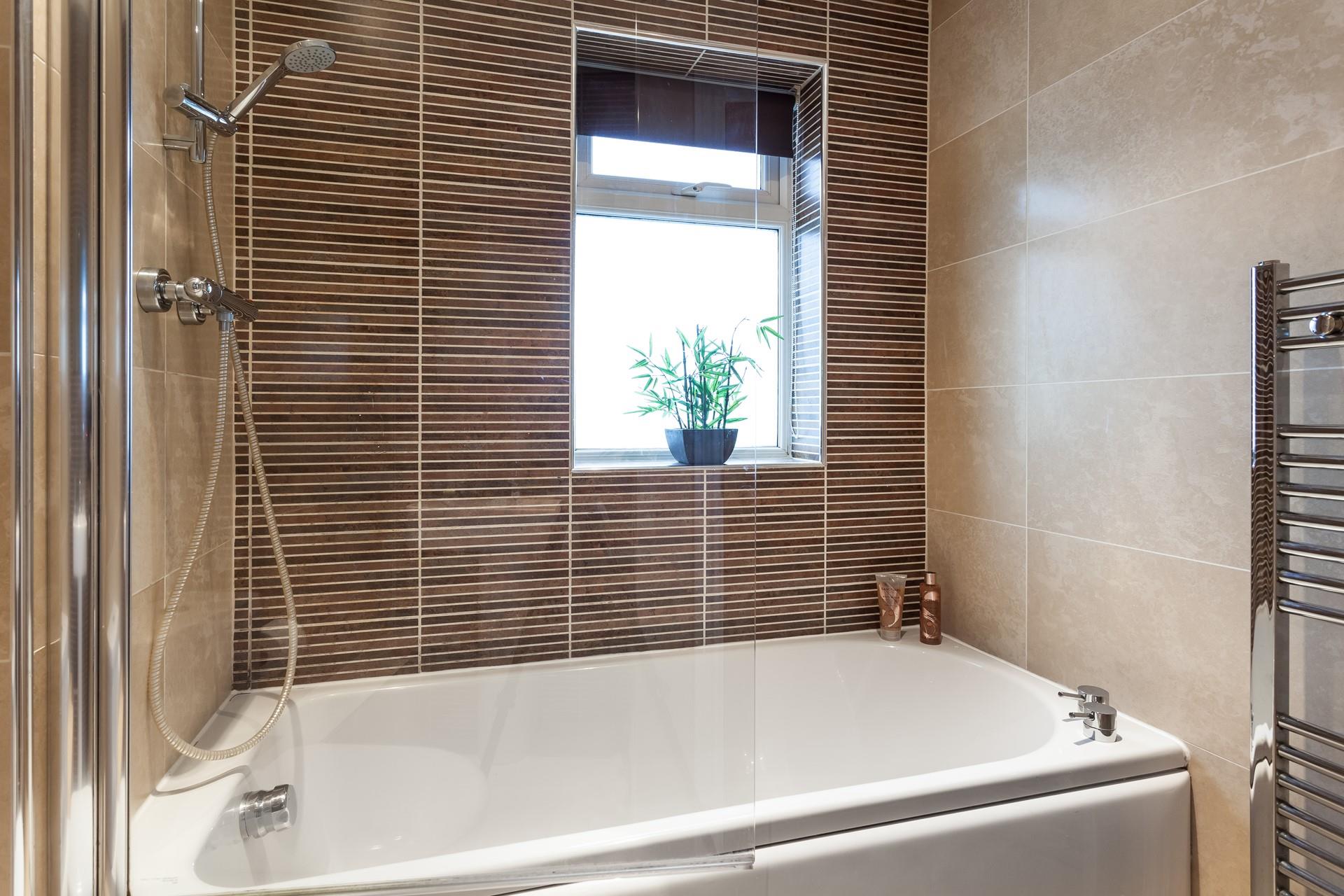 The bath is lovely and spacious, making it the ideal spot to soak your worries away.