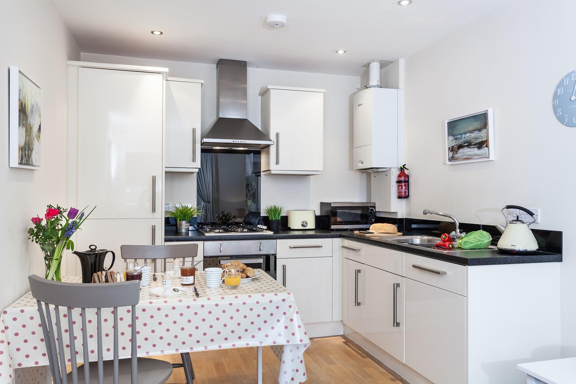 Cute and cosy, the open plan living offers ample space to relax.