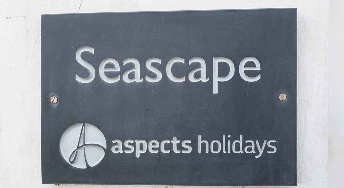 A classic Aspects Holidays slate sign helps make the property easy to find.