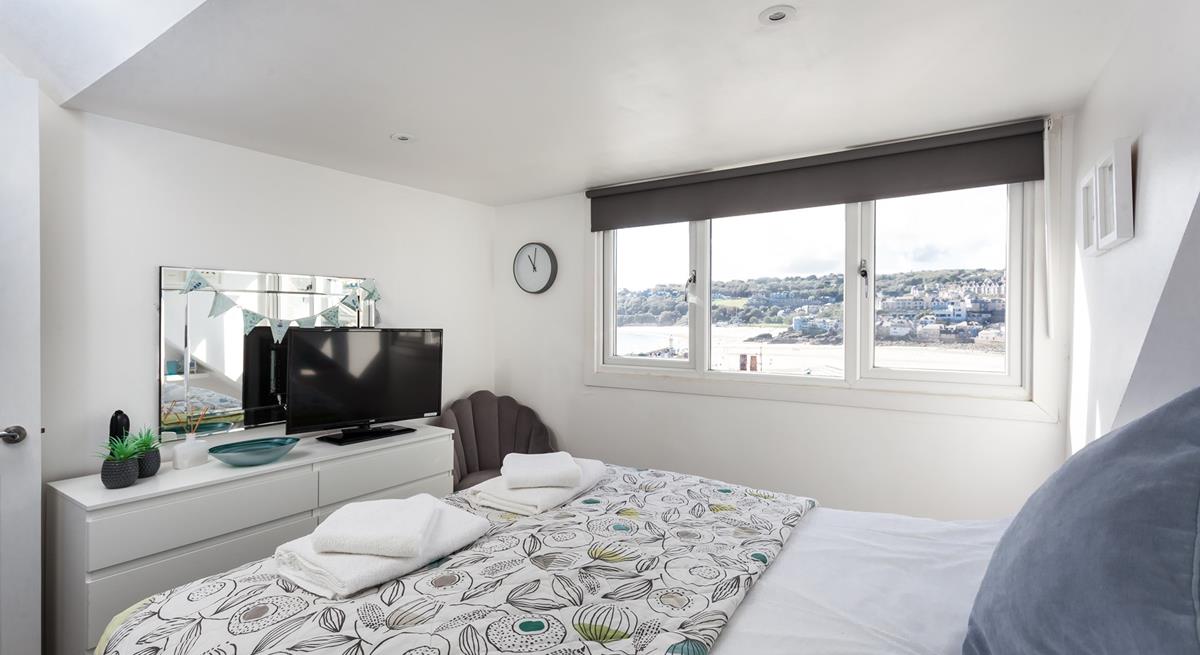 Fun decor and pops of colour bring the magic of the seaside indoors.