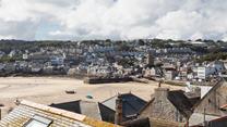 Enjoy views over the rooftops across to the harbour.