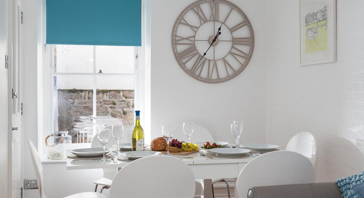 After a fun-filled day exploring St Ives, unwind around the table together with a glass of wine.