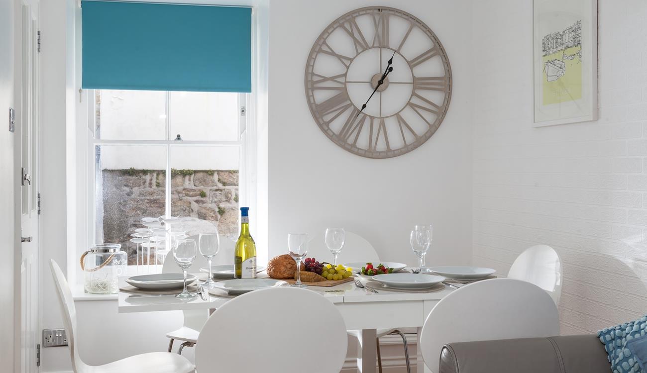 After a fun-filled day exploring St Ives, unwind around the table together with a glass of wine.
