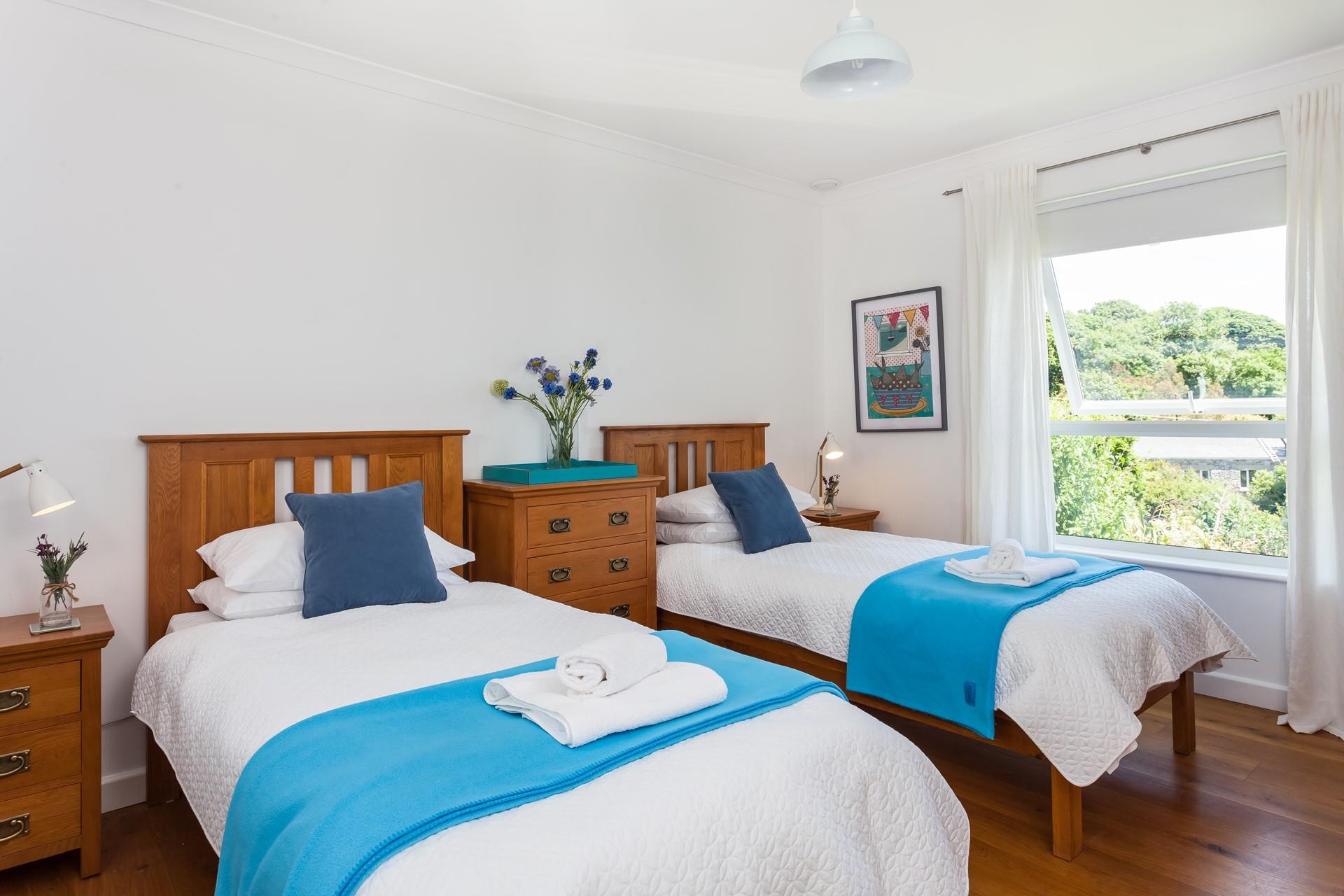 Bedroom 3 has twin beds which are perfect for kids or adults.