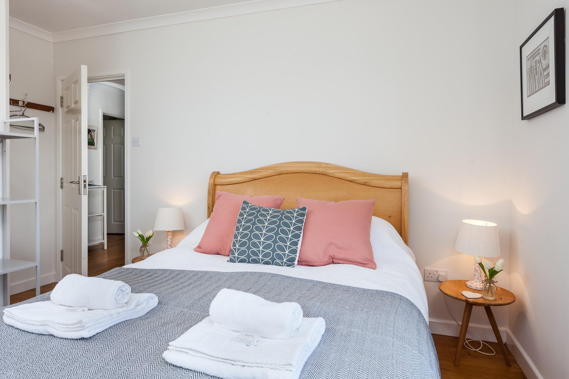 Bedroom 2 has a double bed to cosy into for a dreamy night's sleep.