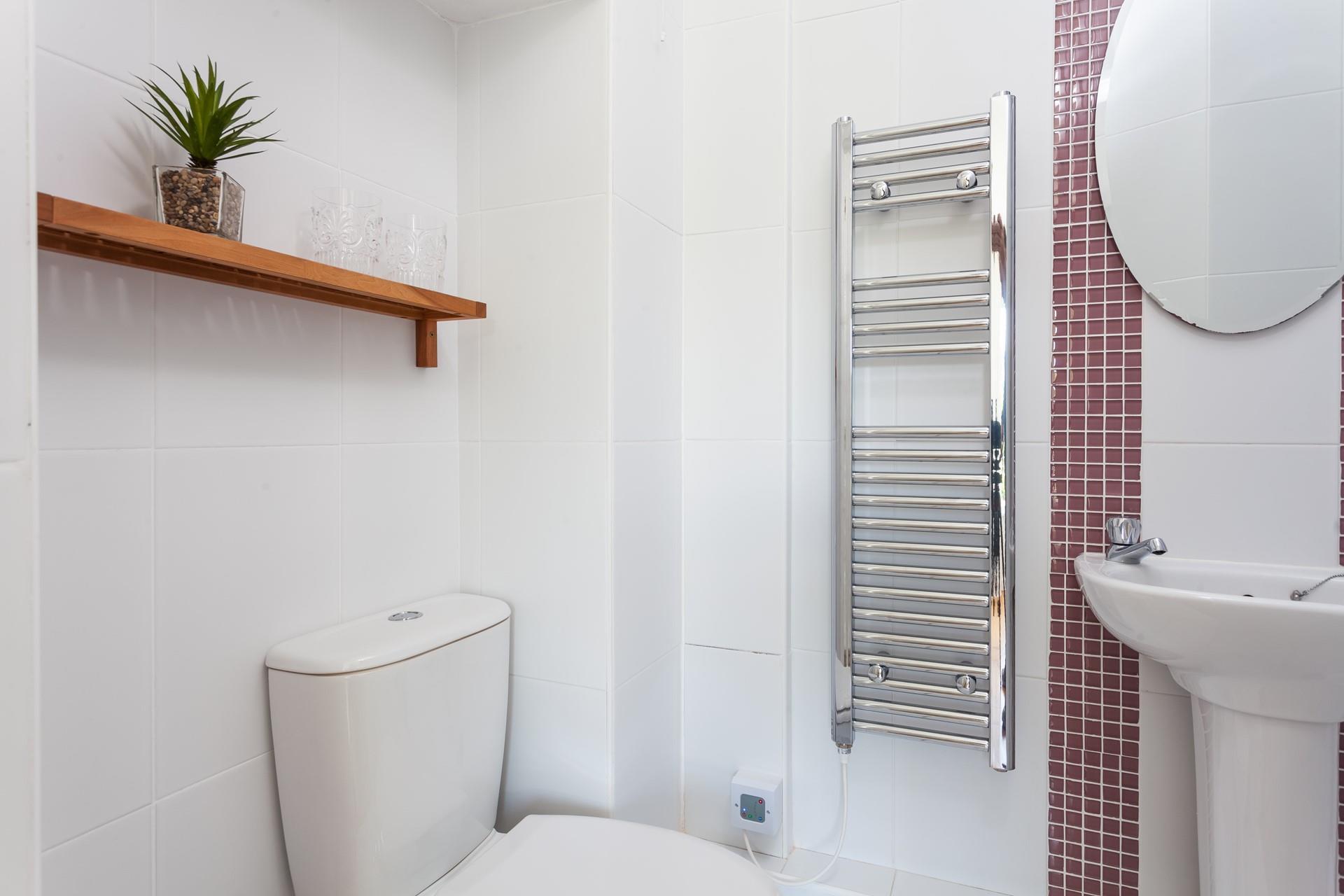Enjoy warm fluffy towels fresh from the heated towel rail.
