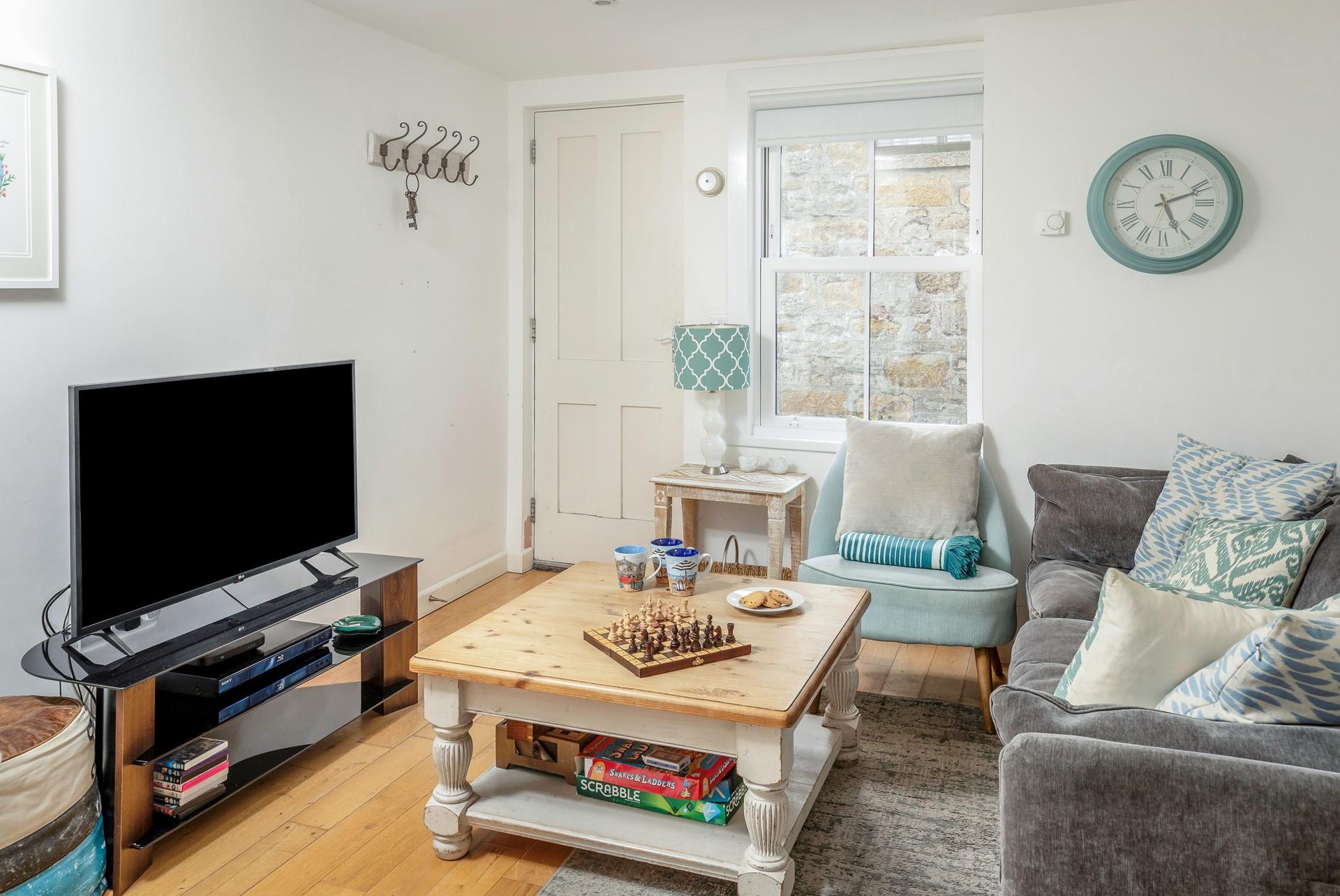 A restored fisherman's cottage, Harbour View Cottage is now a cosy retreat whatever the season.