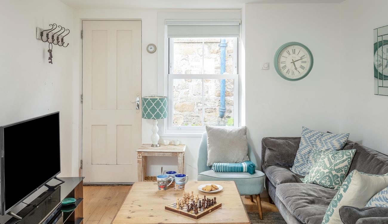 Classic furniture and calming colours have created a homely space.