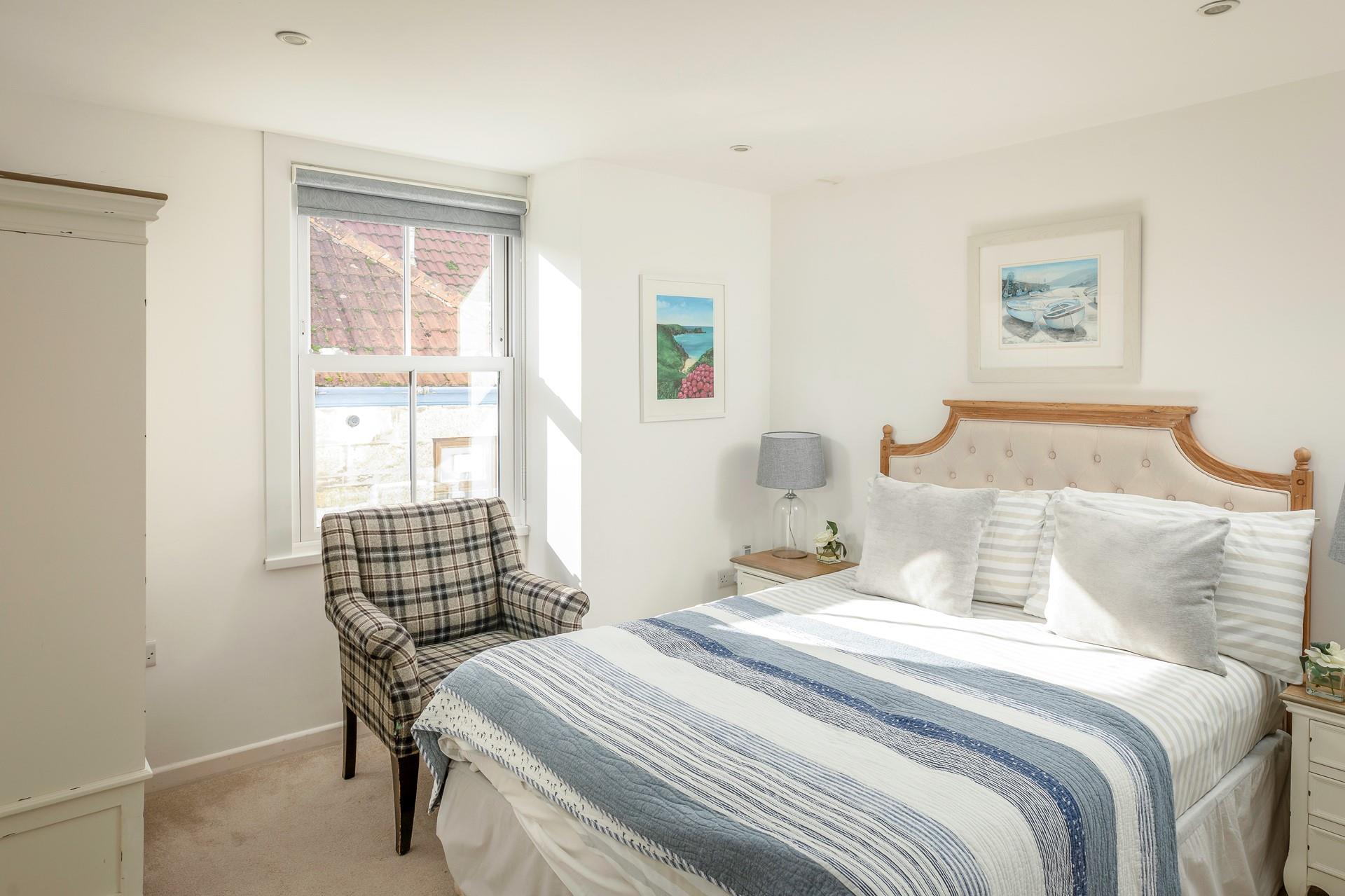 Calm colours and minimalistic decor have created a relaxing space to unwind in.