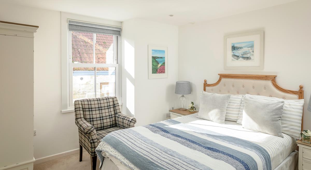 Calm colours and minimalistic decor have created a relaxing space to unwind in.