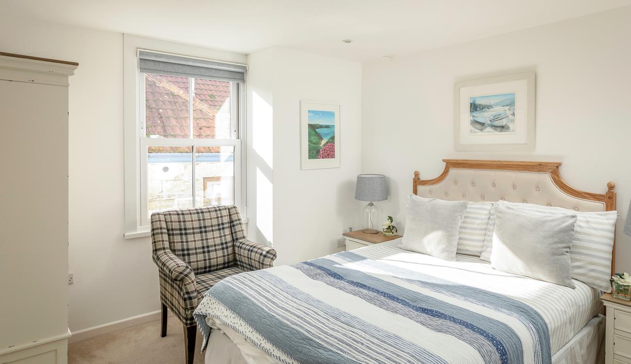 Calm colours and minimalistic decor have created a relaxing space to unwind in.