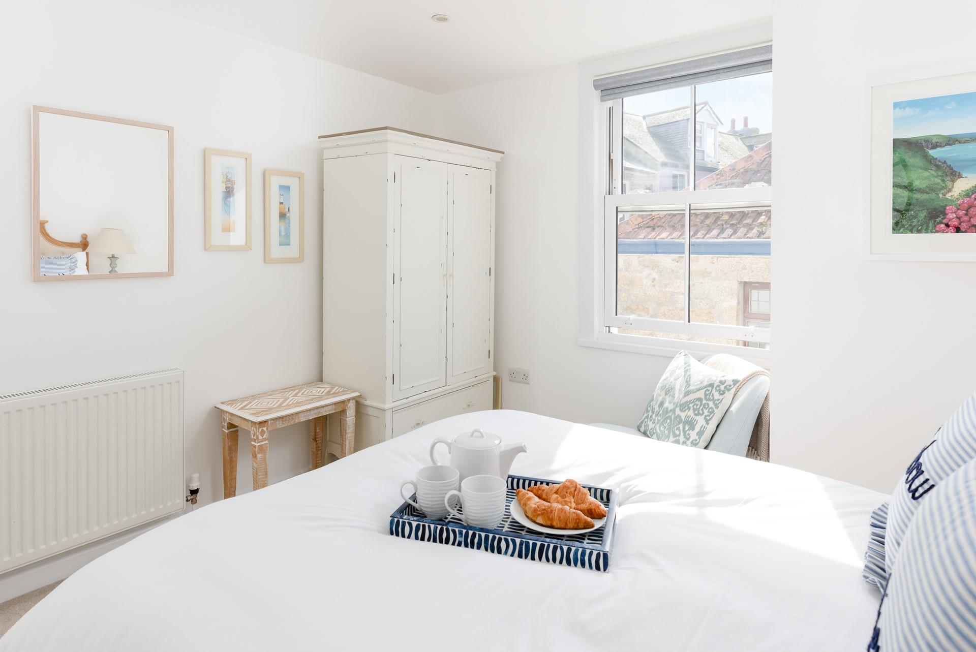 The comfortable bed promises a restful sleep.