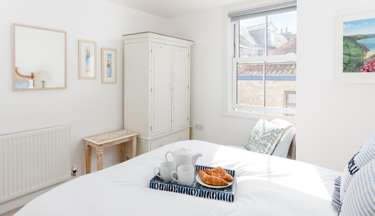 The comfortable bed promises a restful sleep.