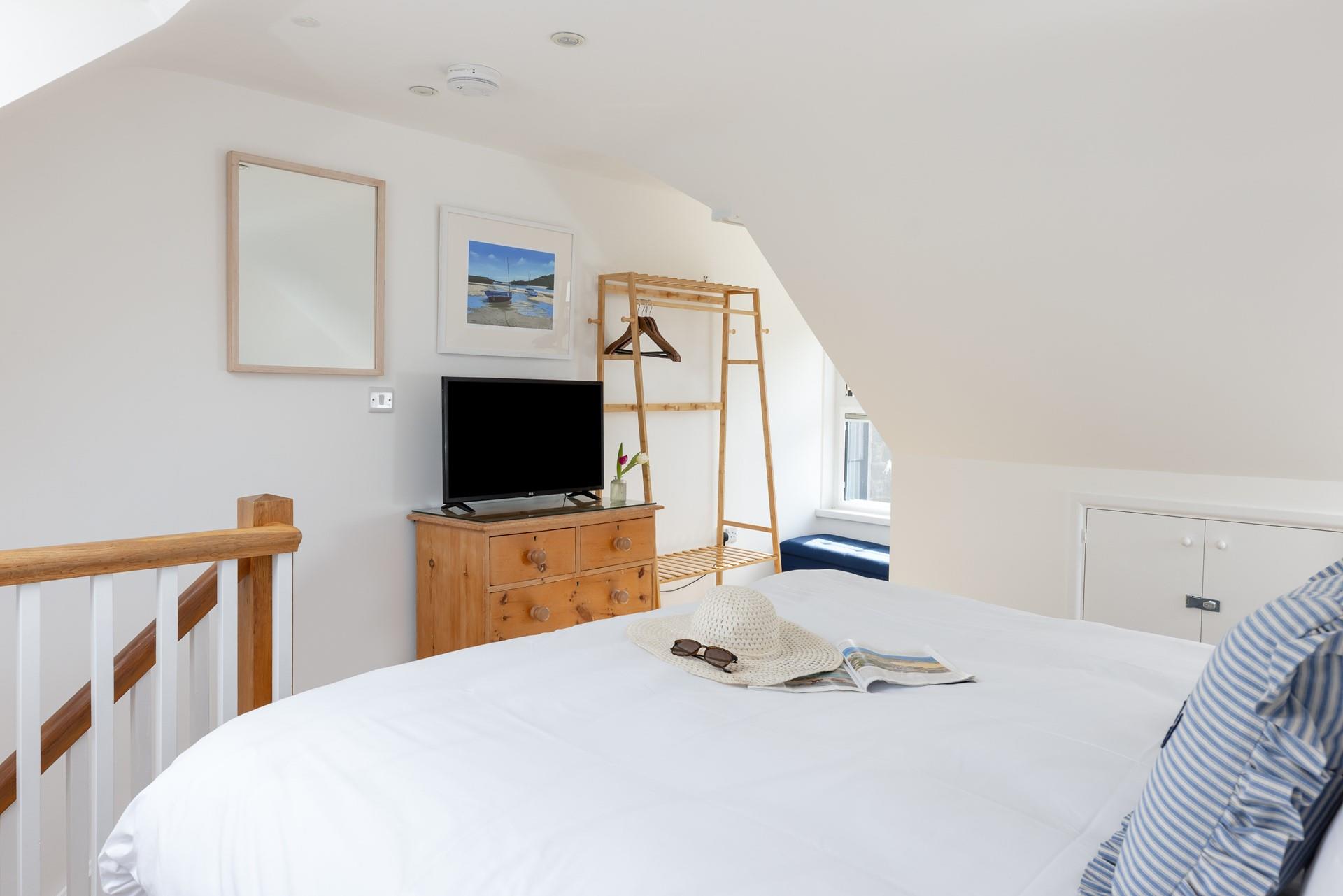 Watch tv from the comfort of bed after a day of exploring. 